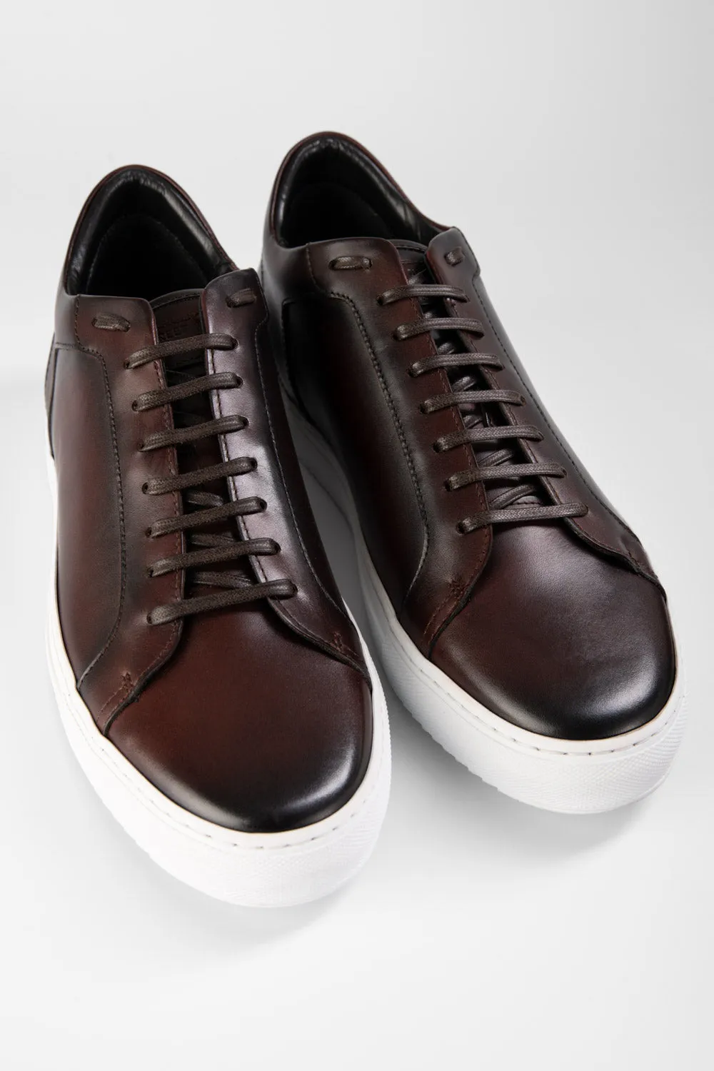 SOHO chestnut patina sneakers.