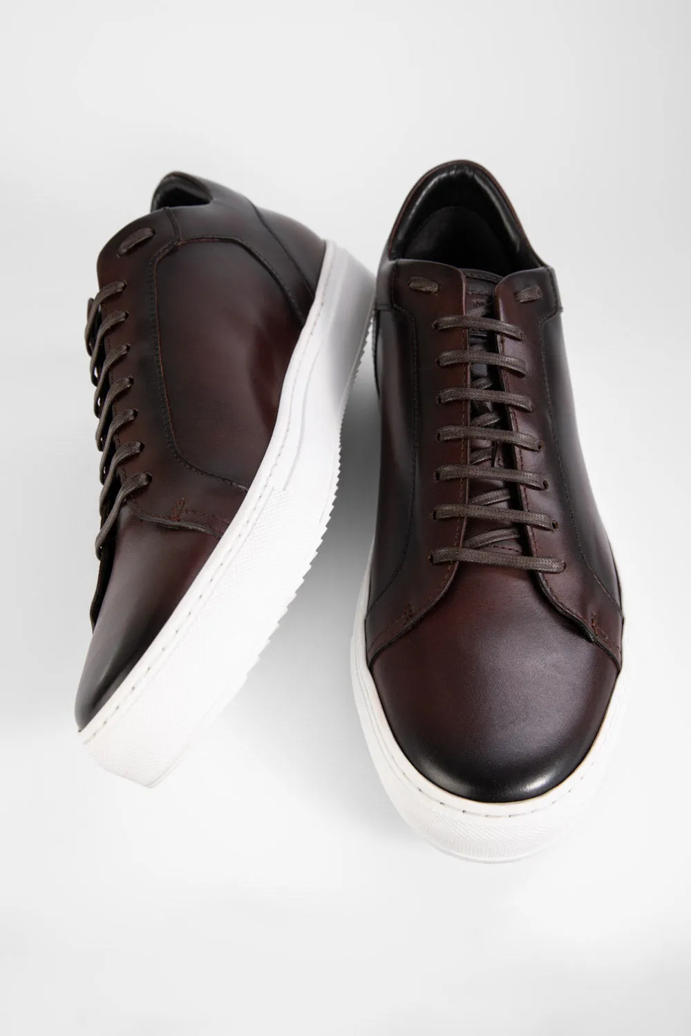 SOHO chestnut patina sneakers.